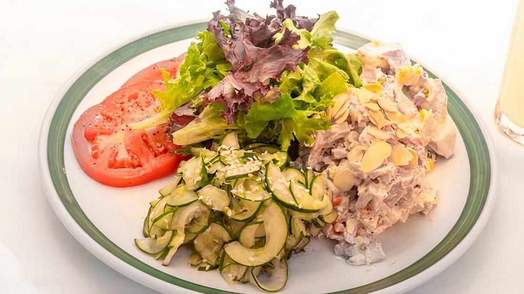 Chicken Salad Platter · Scoop of chicken salad, potato and cucumber salads served with sliced tomatoes, mixed field greens and vinaigrette.