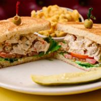 Roasted Chicken Salad Sandwich · Chicken salad sandwich served with chips, slaw or french fries on choice of whole wheat or s...