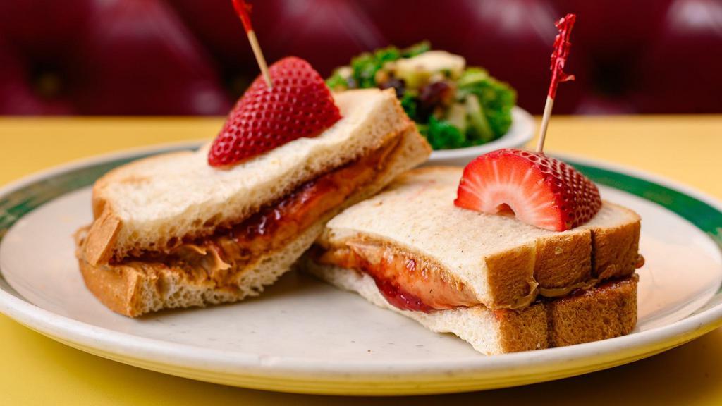 Pb & J Sandwich · Peanut butter & strawberry jelly, served with chips, slaw or french fries on choice of whole wheat or sourdough bread.