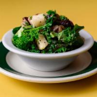 Kale Salad · Kale, dried cranberries, walnuts, granny smith apples & baby spinach tossed in a lemon, popp...