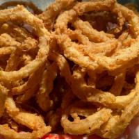 Basket Of Shaved Fried Onions · Shaved fried onion rings