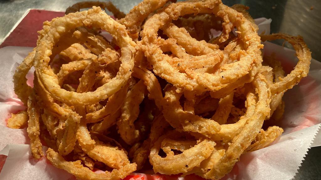 Basket Of Shaved Fried Onions · Shaved fried onion rings