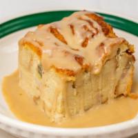 Banana Bread Pudding · One piece topped w/ caramel sauce.