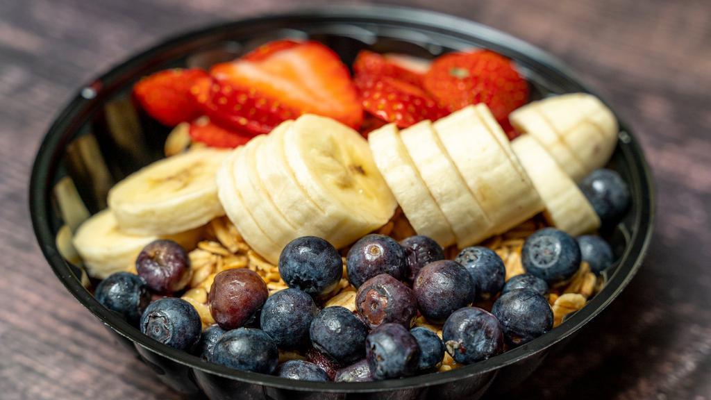Açai Bowls · Açai sorbet, bananas, strawberries, frozen blueberries, and choice of oats and honey or fruit-n-nut granola.