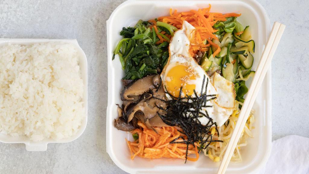 Bibimbap (비빔밥) · Consuming raw or undercooked meats, seafood, and/or chicken eggs may increase your risk of foodborne illness.