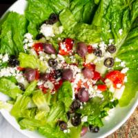 Greek Salad · Romaine, tomatoes, cucumber, feta cheese, kalamata and Greek vinaigrette dressing.