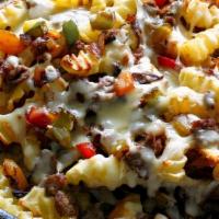 Beef Cheesesteak Fries · Beef cheesesteak loaded on top of fries with onions, pepper, American cheese, provolone and ...