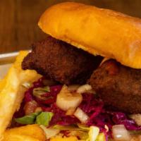 Falafel, Caramelized Carrot Aioli, Pickled Red Cabbage, Lettuce, Sweet Criolla, Sriracha & Fries · 