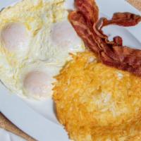 Breakfast Combo No. 1 · Two eggs any style, hash browns, choice of bacon, ham, sausage or turkey sausage and toast.