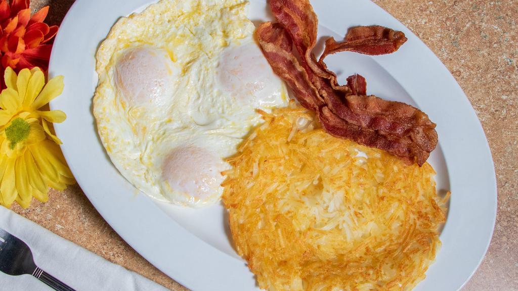 Breakfast Combo No. 1 · Two eggs any style, hash browns, choice of bacon, ham, sausage or turkey sausage and toast.
