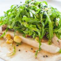 Tofu Taco
 · Marinated and grilled tofu. Topped with lettuce, sesame soy vinaigrette, shiitake mushrooms,...