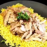 Shawarma · Yellow rice topped with chicken or beef shawarma.