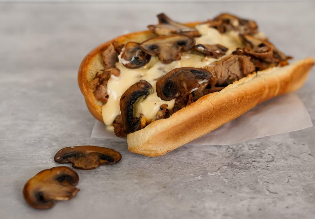 Mushroom Cheesesteak · 8” Philly cheesesteak loaded with grilled steak, melted cheese and savory grilled mushrooms on a toasted hoagie roll