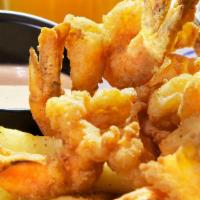 Southern Fried Shrimp · Seasoned hand-breaded shrimp, fried to perfection served with fries and our famous shack sau...