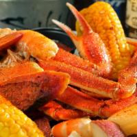 Beach Boil · Shrimp, snow crab legs, sausage, corn, onions, and potatoes served in our seasoned boil.