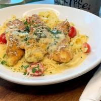 Pan-Seared Chicken Pasta · Pan-seared, panko-breaded chicken with a lemon-caper butter sauce. Served with fettuccine an...