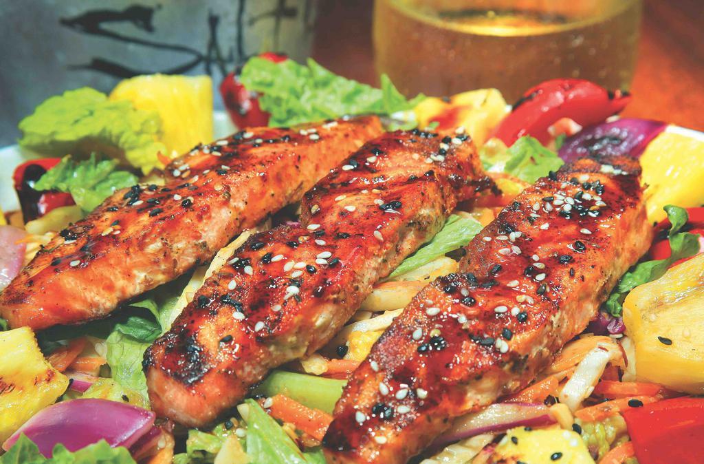 Asian Salmon Salad · Grilled salmon over mixed greens with carrots and cabbage tossed in a ginger dressing topped with fire-roasted red peppers, red onion, grilled pineapple chunks, sliced almonds, green onions and drizzled with a sweet Asian sauce. (Contains Almonds)