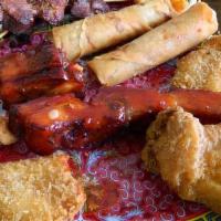 Pu Pu Platter · Included:two wings, two fried wonton, two chicken stick, two spare ribs, two fried shrimp, t...