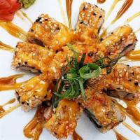 Volcano Roll · Mixed seafood, California roll, spicy mayonnaise, eel sauce, and masago tempura. Sushi rolls...