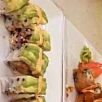 Dragon Roll · Shrimp tempura, avocado, asparagus, and masago. Sushi rolls may contain sesame seeds.