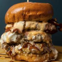 Boss Burger · Gluten free. Three 1/3 Lb. Patties, mild cheddar, jack cheese, more cheddar, cheese sauce, c...