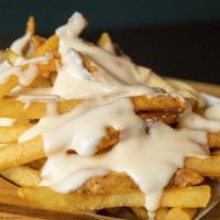 Cheese Fries · Gluten-free, vegetarian. Fries with a side of creamy cheddar and jack cheese sauce.