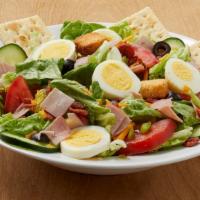 Chef Salad · Chopped iceberg mix with cheese, ham, eggs, tomatoes, cucumbers, onions and green peppers to...