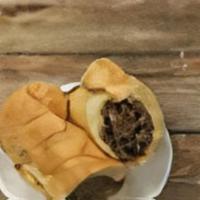 Tj'S Philly Cheesesteak · Grilled steak, provolone, grilled onions on a hoagie roll.