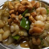 Cashew Shrimp · Shrimp, water chestnuts, snow pea pods and mushrooms. All diced and blended, then sautéed wi...