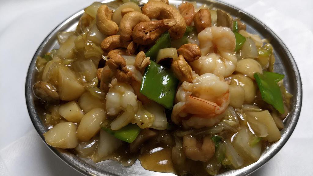 Cashew Shrimp · Shrimp, water chestnuts, snow pea pods and mushrooms. All diced and blended, then sautéed with toasted cashew nuts.