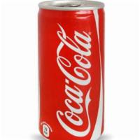 Coke (Can)  · A can of Coke, served cold.