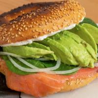 Smoked Salmon Bagel · Toasted bagel with cream cheese, onion, arugula and fresh salmon.