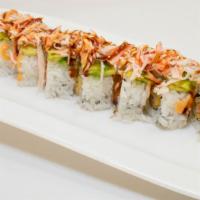 Dragon Roll · Shrimp tempura roll topped with crabmeat, avocado, eel sauce, and spicy mayo.