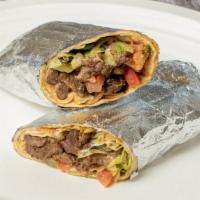 Beef Shawarma Wrap · Lettuce, tomato, onions, pickles, and tahini sauce.