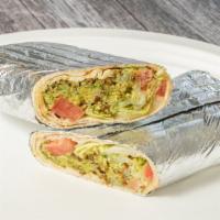 Falafel Wrap · Vegetarian. Lettuce, tomato, onions, pickles, and tahini sauce.