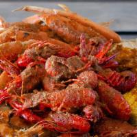 Snow Crab Legs And Crawfish  · (1 cluster) Snow Crab Legs + (0.5 lb) Crawfish
(Every bag includes corn and potato)