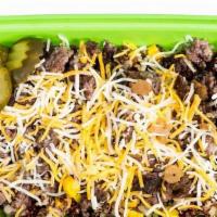 Cheeseburger Bowl · Quinoa with corn and bell peppers, topped with ground beef, cheese, and 5 dill pickle chips....