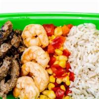 Steak & Shrimp Fajita · Steak, shrimp, corn, roasted red bell peppers, and rice

Calories: 335/ Fat: 8/ Carbs: 32/ P...