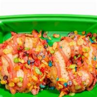 Fruity Pebble Donut · Strawberry protein donut with strawberry icing and Fruity Pebble cereal.