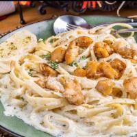 Chicken Alfredo Pasta  · Our famous home-made creamy alfredo sauce tossed in with fresh spaghetti and topped with gri...