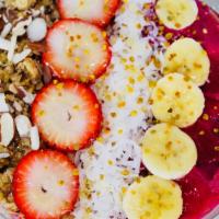Dragon Heart · Base of the bowl with strawberry pineapple banana dragon fruit and almond milk. on top with ...
