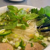 Pho Deluxe Soup · Beef rice noodles soup with rare steak, well-done flank brisket, tendon, beef meatball, and ...