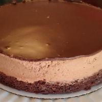 Chocolate Raspberry Mousse Cake · A moist chocolate base layer topped with a thick light and fluffy raspberry chocolate mousse...