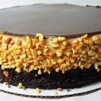 Chocolate Peanut Butter Mousse Cake · Rich chocolate layers baked with Callebaut chocolate chunks, topped with our very own peanut...