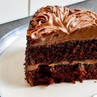 Vegan Old Fashion Chocolate Cake · Our traditional chocolate cake frosted with a rich non dairy chocolate frosting. So moist an...