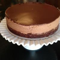 Vegan Raspberry Chocolate Mousse Cake · A layer of chocolate cake covered with a healthy layer of raspberry mousse and a thin layer ...