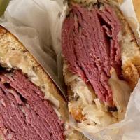 Pastrami Special · Pastrami topped with swiss cheese and cole slaw. Served on grilled rye bread.