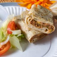 Beef And Cheese Burrito · Beef with green chiles and 3 slices of cheese in a hand-stretched tortilla. Serves two 7 oz ...
