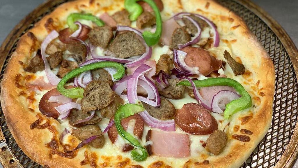 Deluxe Pizza · Pepperoni, Italian sausage ground beef, ham, mushrooms. Black olives, onions, green peppers.