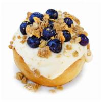 Blueberry Pie Roll* · cream cheese frosting topped with homemade pie crumble and fresh blueberries